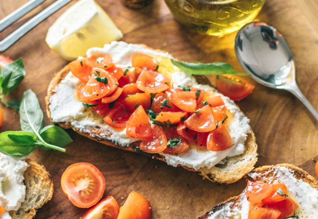 Bruschetta with fresh tomatoes and basil on toasted bread, a diabetes-friendly Italian food option