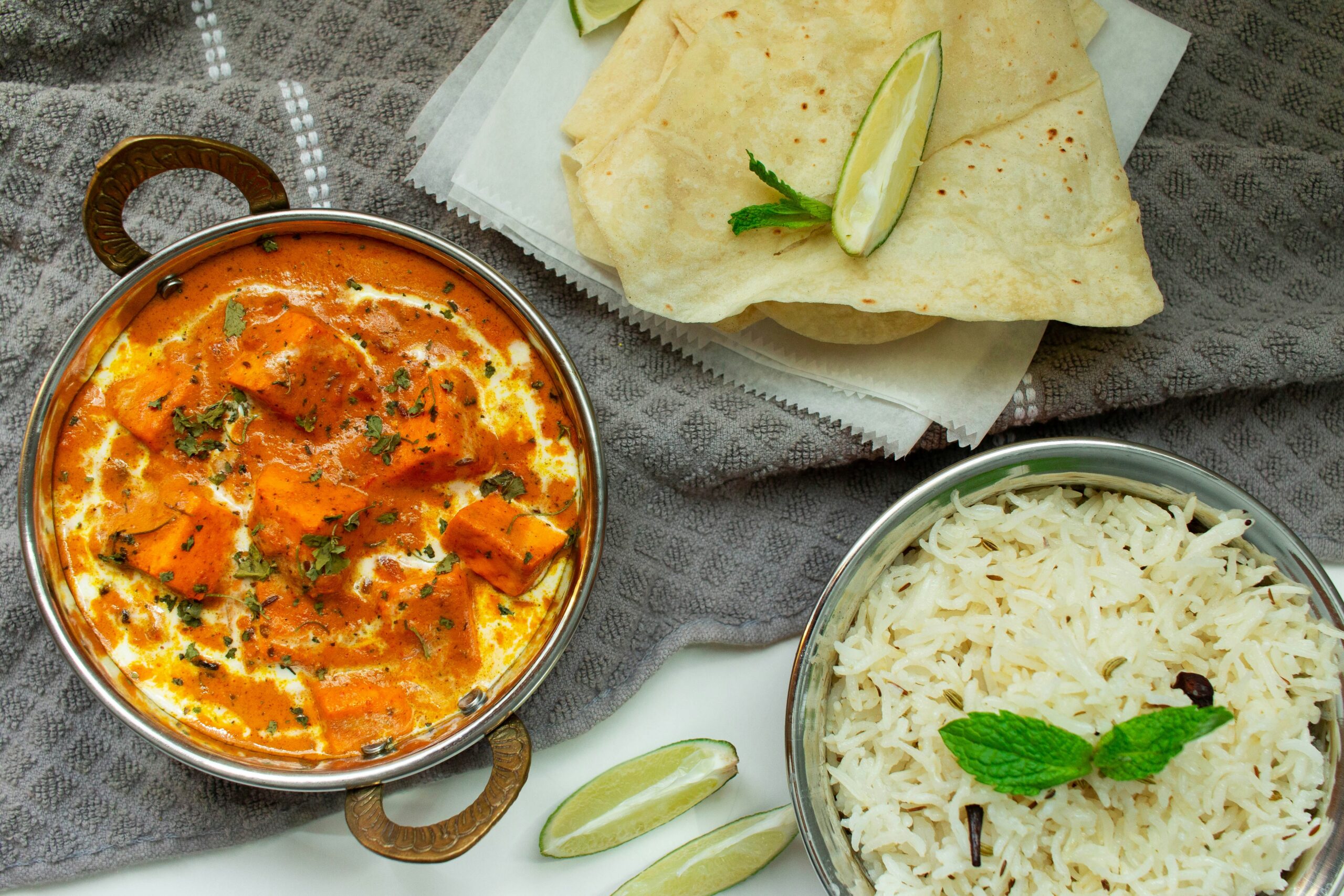 Paneer butter masala with basmati rice and roti, a South Asian diet meal for people with diabetes